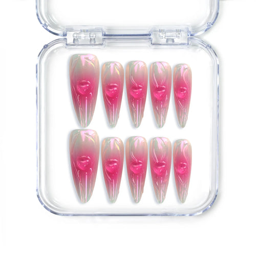 Handmade pink almond Singapore press on nails with heart accents and ombré holographic finish by Naillover