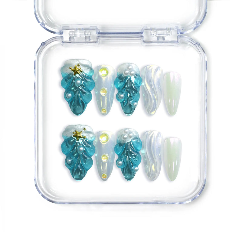 Handmade blue almond press on nails with 3D shell textures and gold starfish, from Singapore brand Naillover