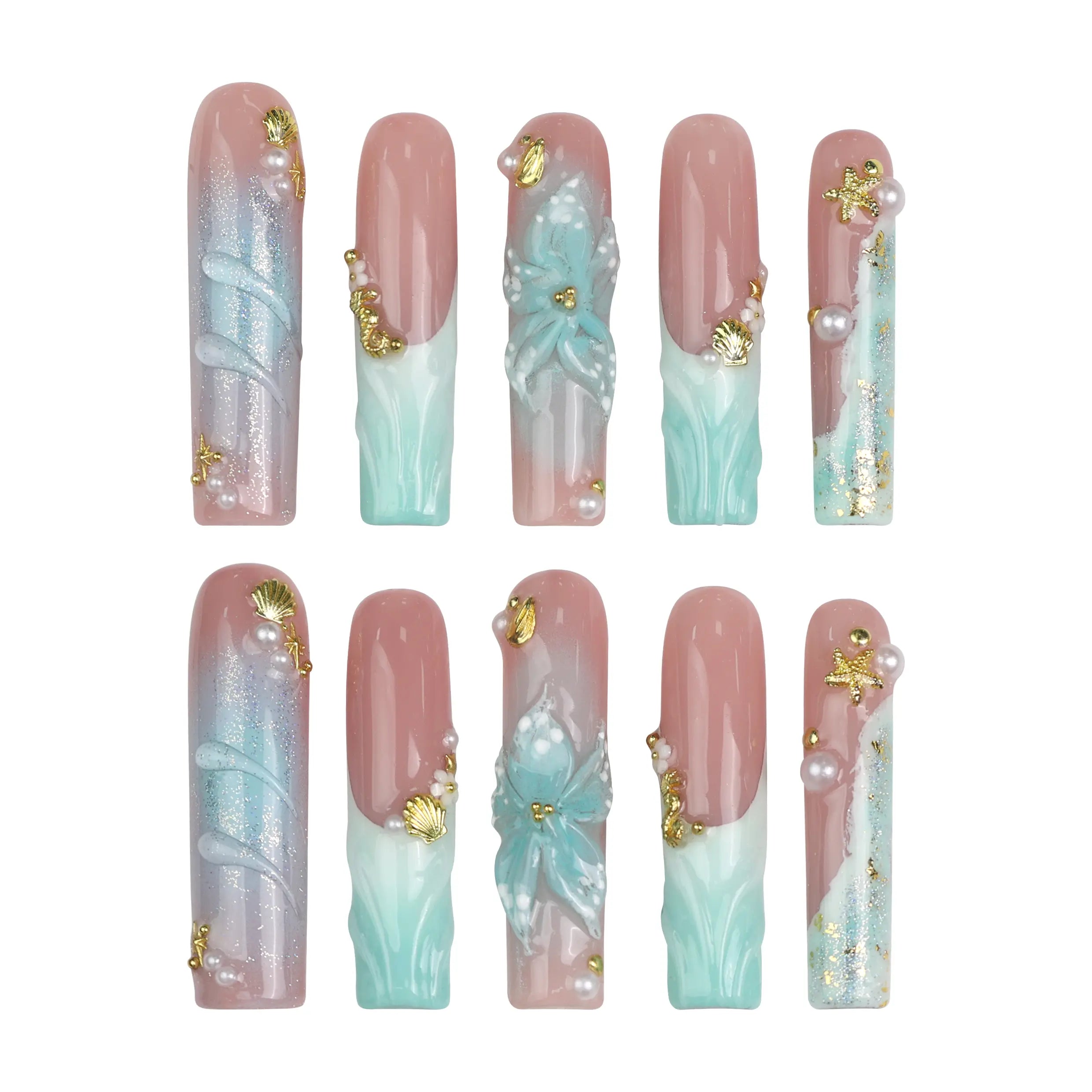 Product flat lay of Singapore handmade long pipe press on nails featuring 3D ocean waves, flowers, and gold starfish by Naillover
