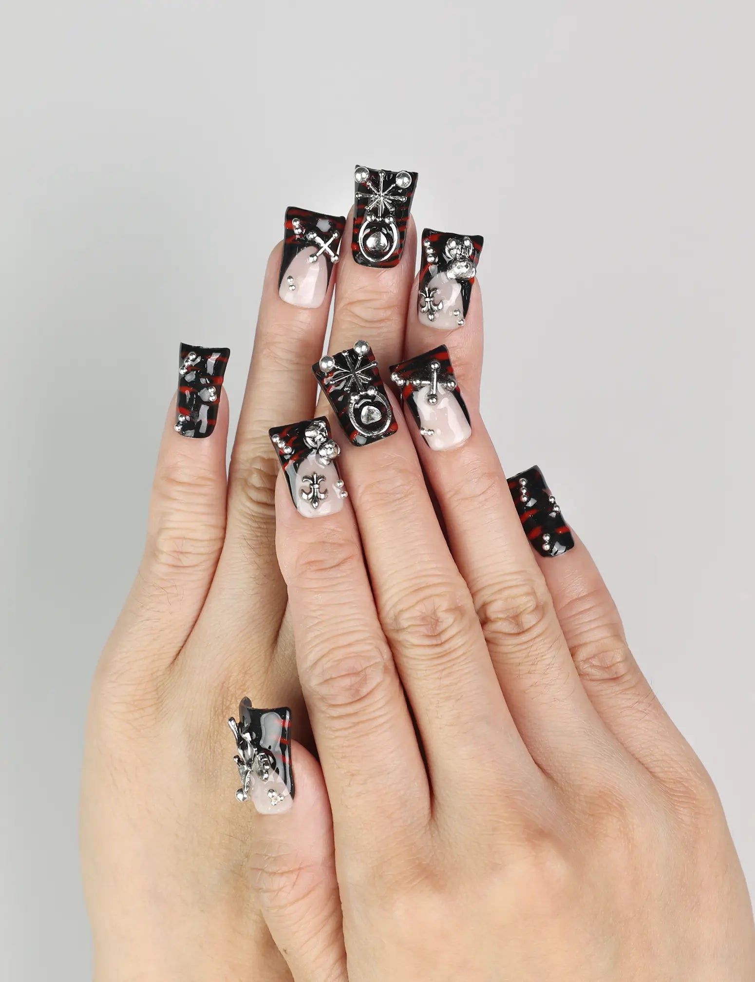 Model wearing Shadow Forge Y2K metallic Singapore press on nails with silver shimmer accents by naillover