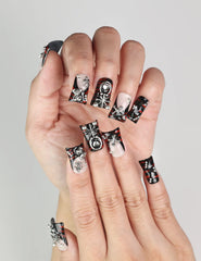 Close-up of Shadow Forge Y2K handmade press on nails in metallic purple and silver by naillover