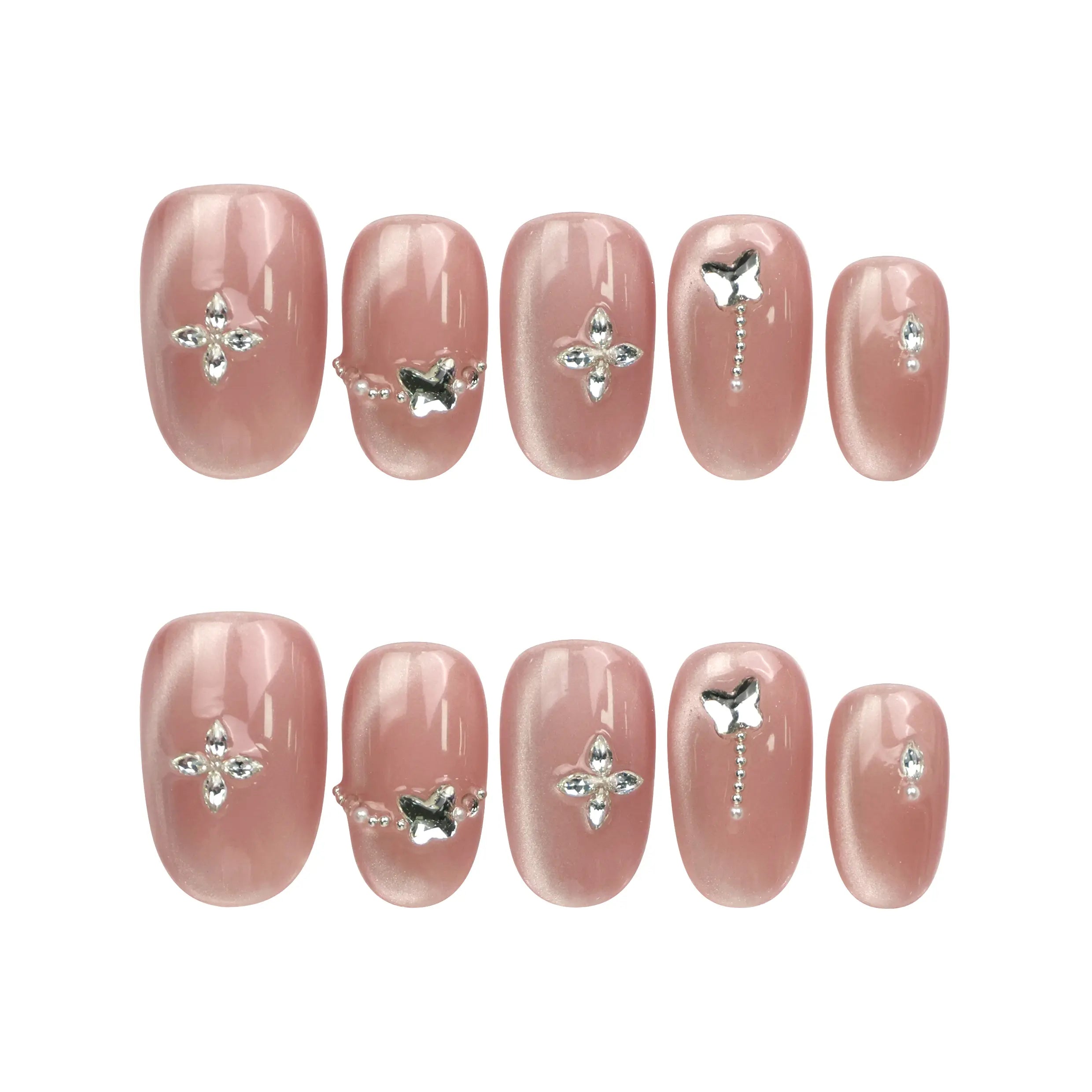 Flat lay of Naillover Silver Charm Singapore press on nails set, featuring handmade glossy nails with cat eye finish and silver butterfly charms.