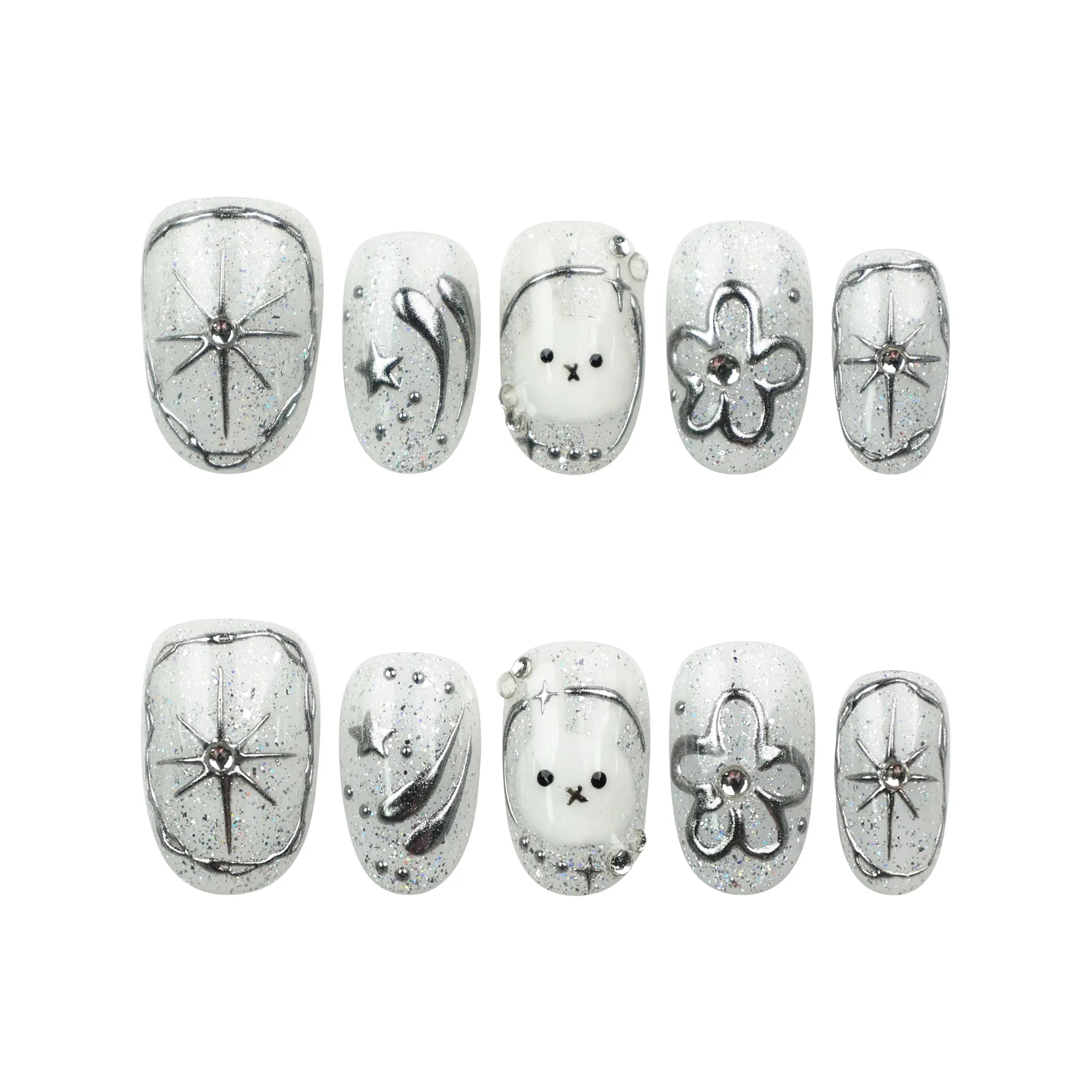 Flat lay of Naillover Silver Starry Cutie press on nails set, featuring galaxy shimmer base, cartoon motifs, and playful cute nail accents.