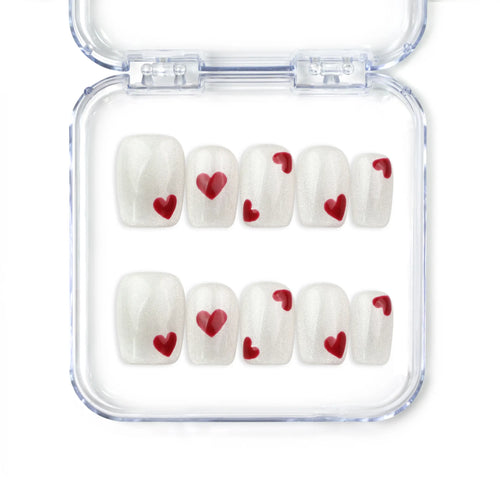 naillover Sparkle Love Singapore press on nails in white glitter with bold red heart accents, handmade press on nails set for a romantic coquette nails look.