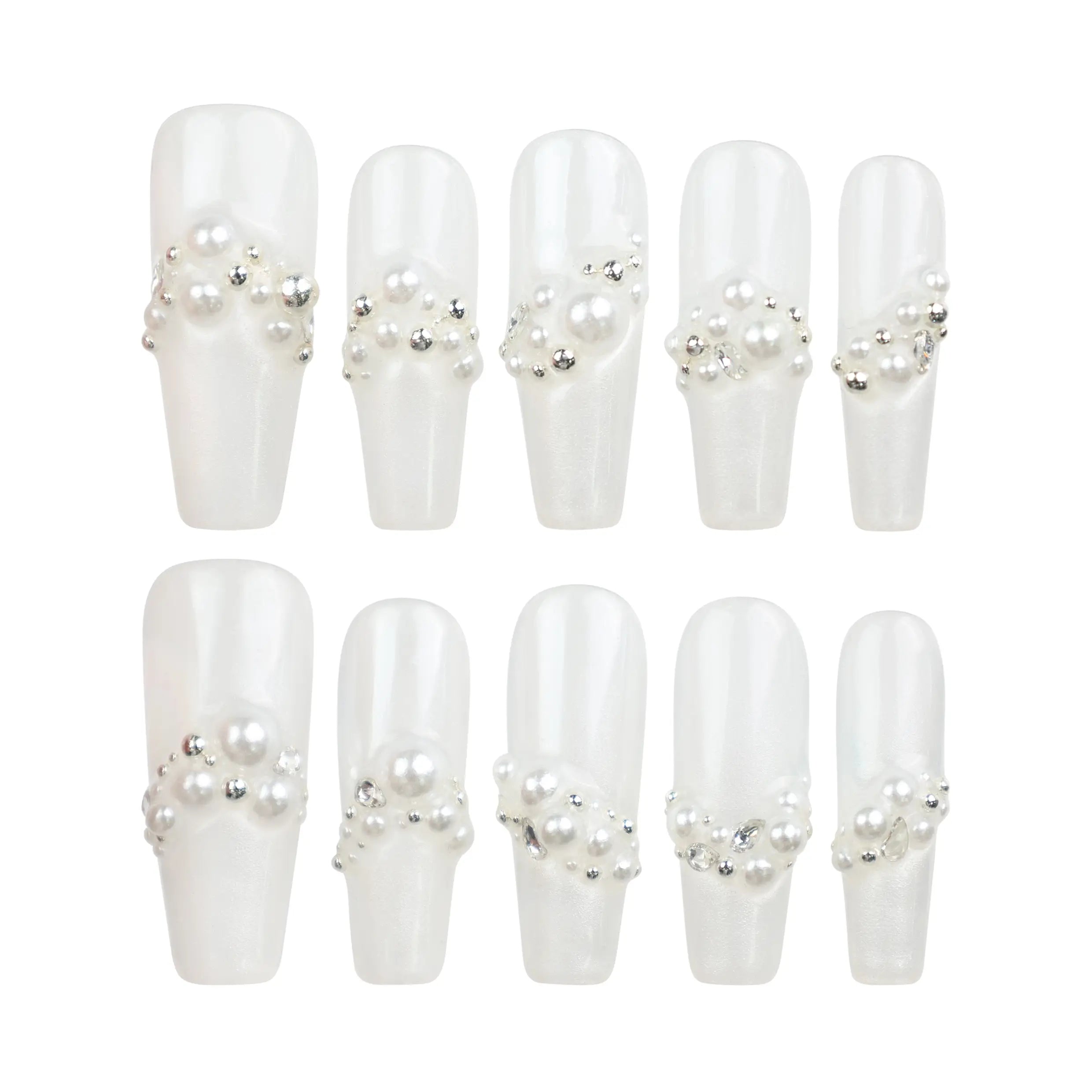 Woman holding a glass while wearing Starlight Singapore press on nails with white base and silver stars