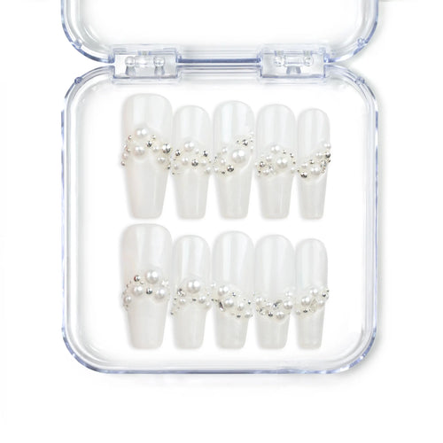 Starlight handmade Singapore press on nails with white base and silver star embellishments by naillover