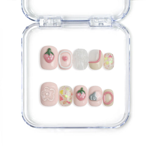 Singapore handmade short press on nails with strawberry and heart patterns on soft pink base by Naillover