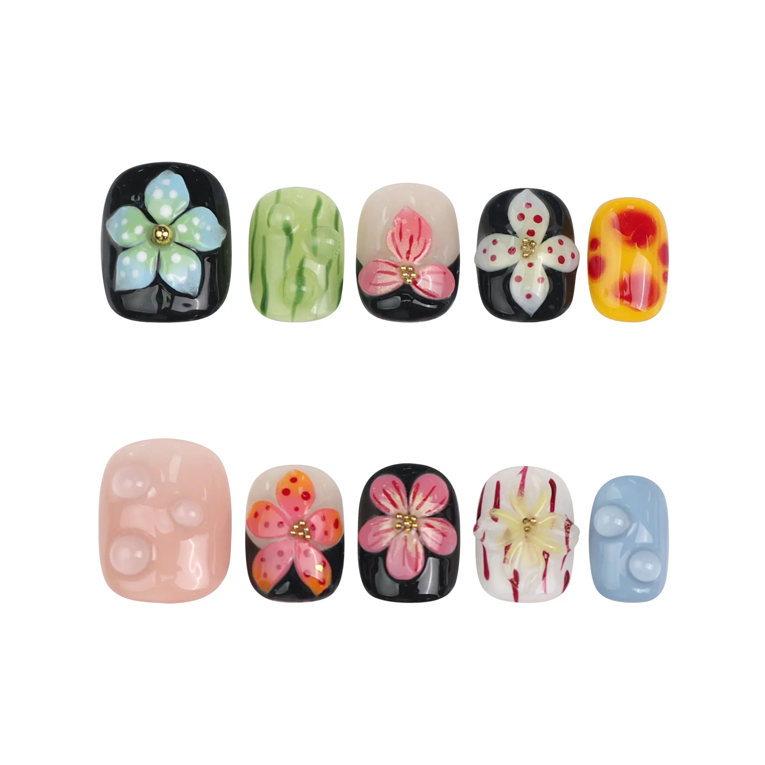 Flat lay of Singapore handmade squoval press on nails with nude and black contrast and dimensional pink floral art by Naillover