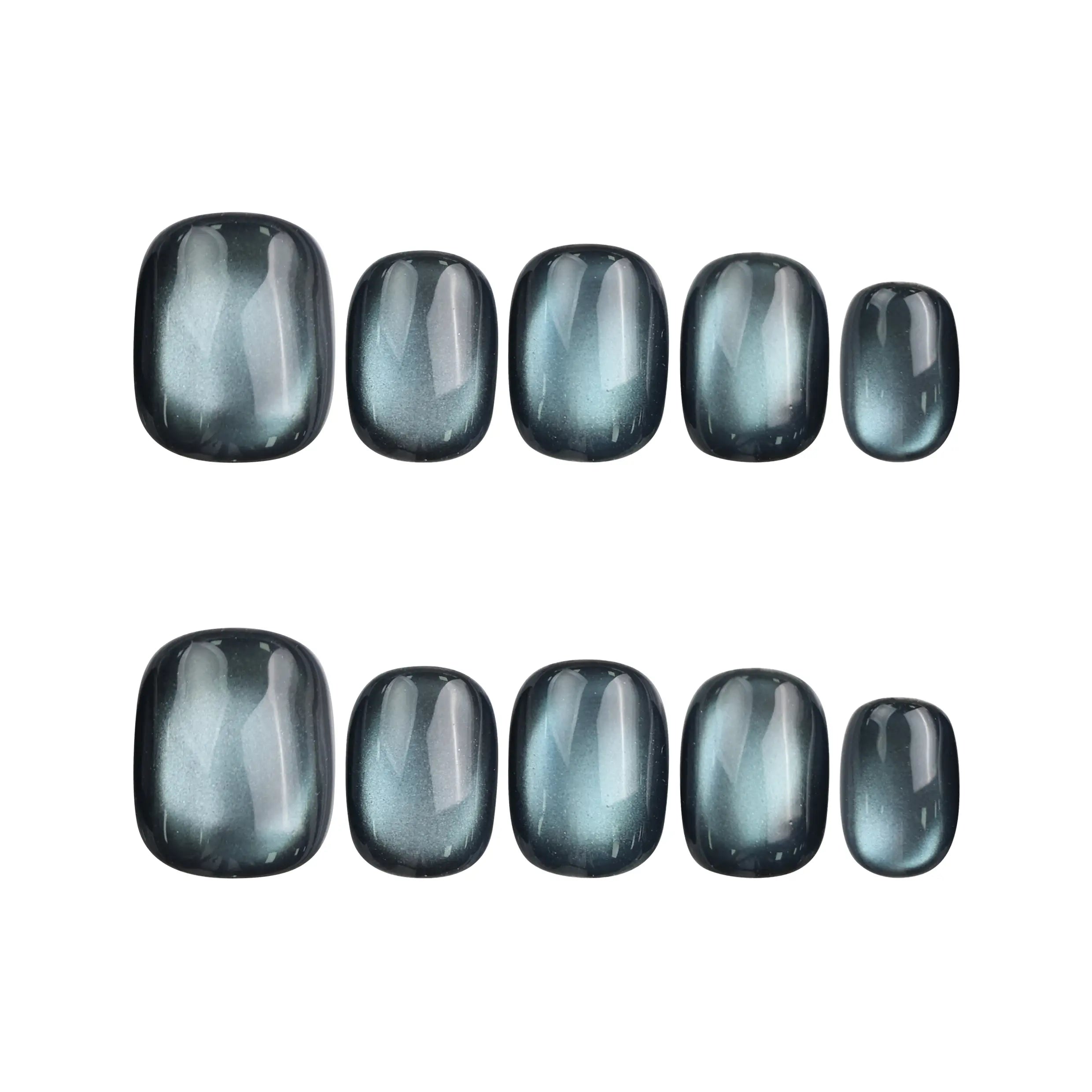 Teal Gleam handmade Singapore press on nails set on white background, glossy teal iridescent design, trendy nails