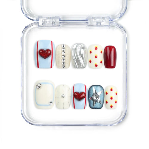 Vibrant Pop handmade Singapore press-on nails with ivory base, red lips, silver buttons, and playful polka dots by naillover.