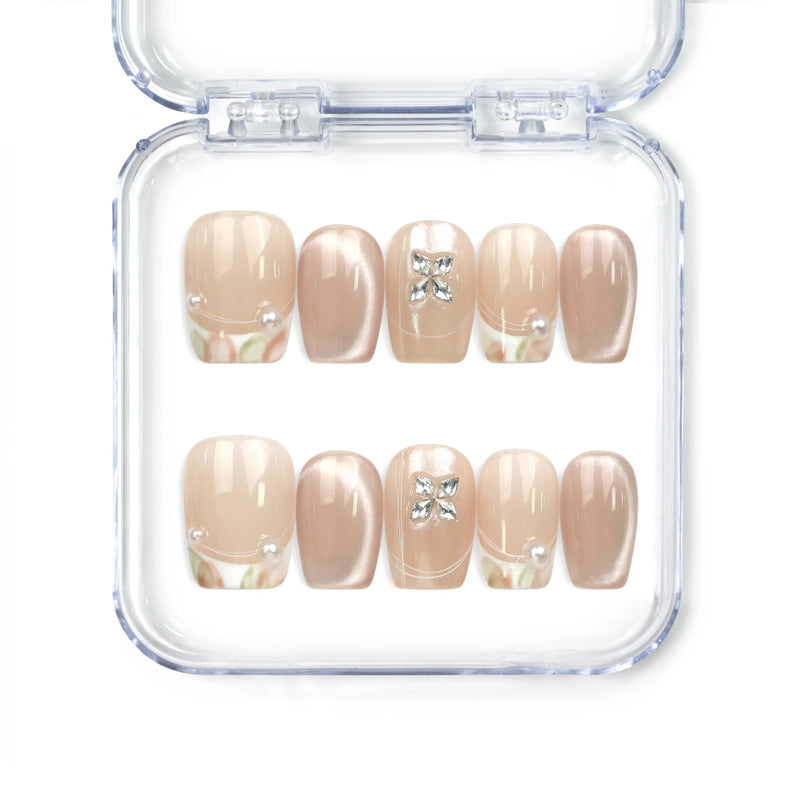 Naillover Whisper Beige handmade press on nails with sheer-to-nude gradient and silver gemstone accent from Singapore press on nails collection.