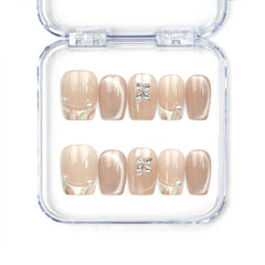 Naillover Whisper Beige handmade press on nails with sheer-to-nude gradient and silver gemstone accent from Singapore press on nails collection.