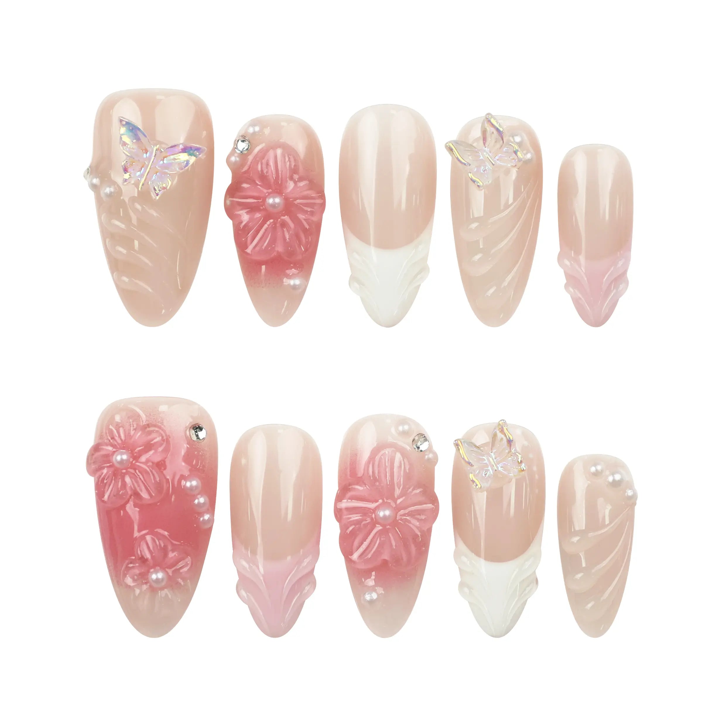 Flat lay of Naillover Whispering Petals in Pink Haze press on nails set featuring neutral tones with 3D blossoms and butterfly charms.