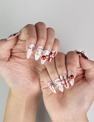 Festive Xmas Sparkle red and white handmade press-on nails with bows, Singapore press-on nails by naillover
