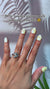 Close-up of Nail Lover’s Coral Whimsy press-on nails, featuring a playful coral hue with whimsical design details, perfect for a fun and stylish look.